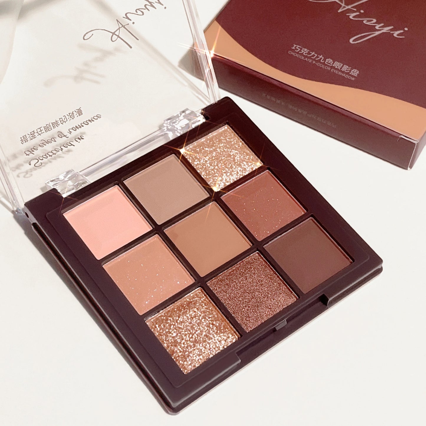 9-Color Chocolate Eyeshadow Palette with Pearl Shine, Fine Glitter, Matte Earth Tones, and Highlighting for Makeup